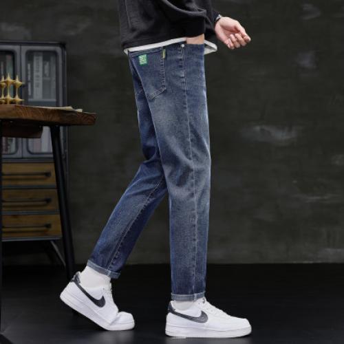 唐狮2026秋冬新款男牛仔裤宽松口袋小脚裤水洗潮流休闲修身男裤
