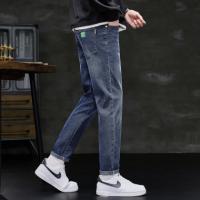 唐狮2026秋冬新款男牛仔裤宽松口袋小脚裤水洗潮流休闲修身男裤