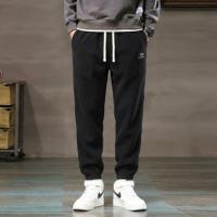 唐狮2025秋冬休闲长裤运动风男时尚侧边织带基础设计束脚裤日常
